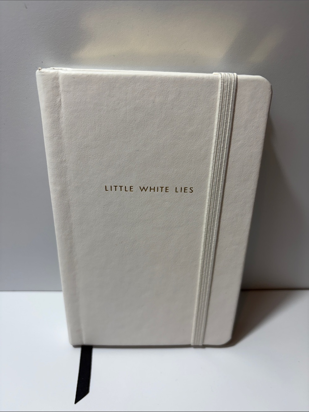 kate spade Cream "Little White Lies" Elastic-Band Notebook